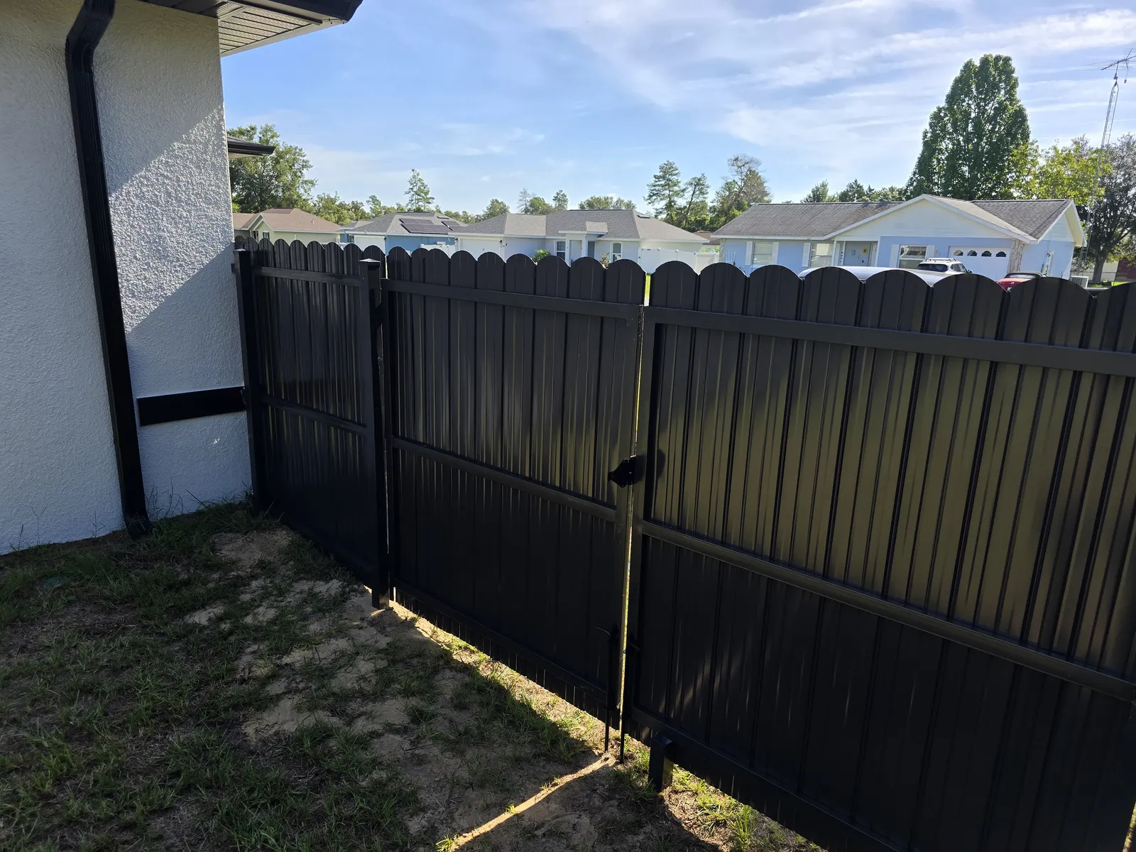 Durafence, black gate by Crystalline Home Improvement in Central Florida