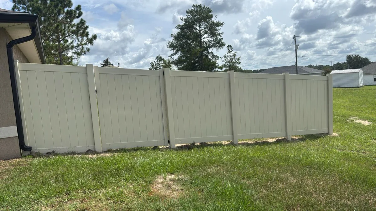 Vinyl privacy, tan modern home by Crystalline Home Improvement in Central Florida