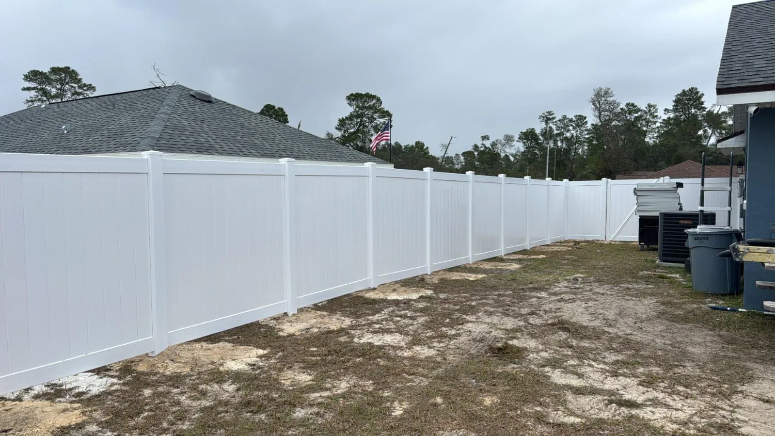 Vinyl privacy, white double gate by Crystalline Home Improvement in Central Florida