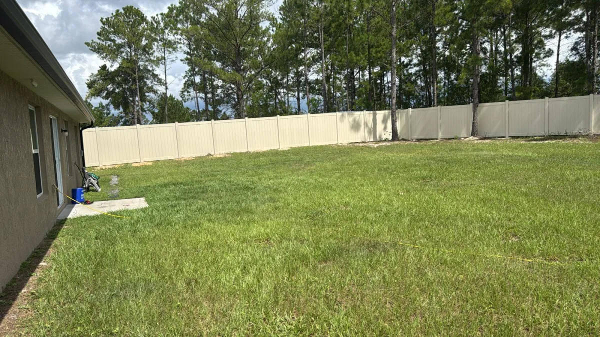 Vinyl privacy, white driveway front by Crystalline Home Improvement in Central Florida