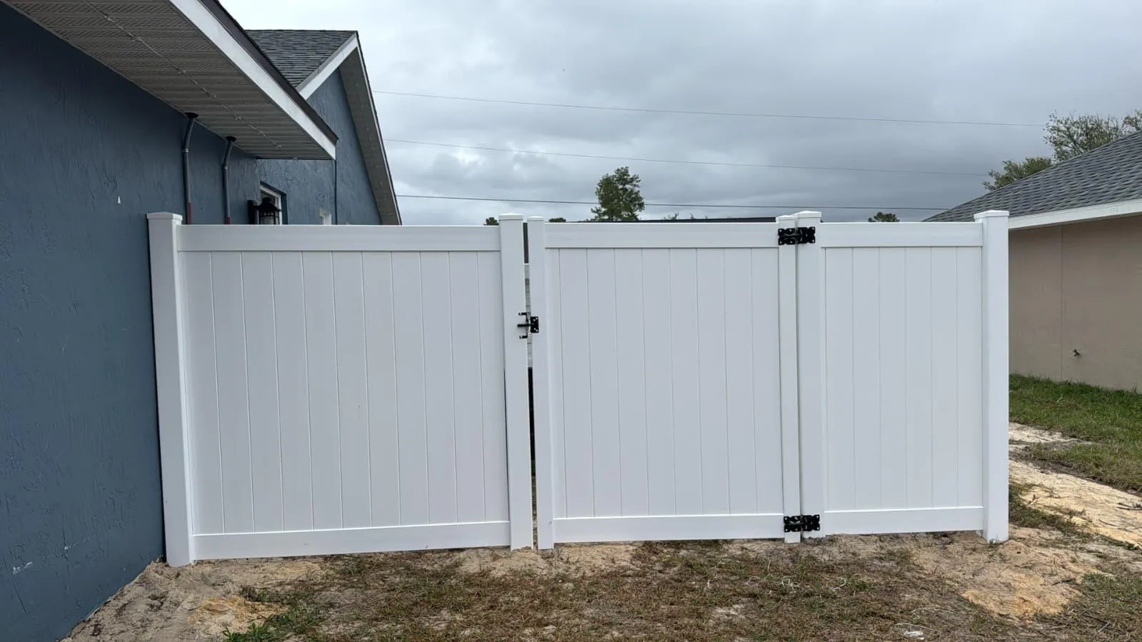 Vinyl privacy, white long run by Crystalline Home Improvement in Central Florida